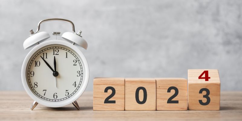 a clock next to number blocks showing the date 2024 