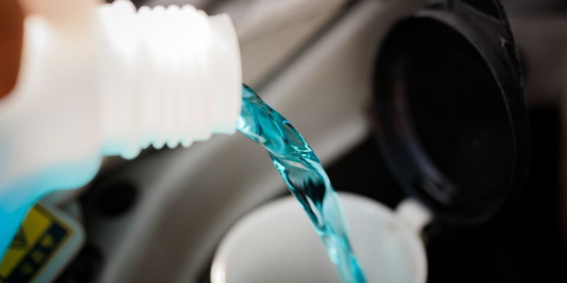 Wiper fluid being topped up 