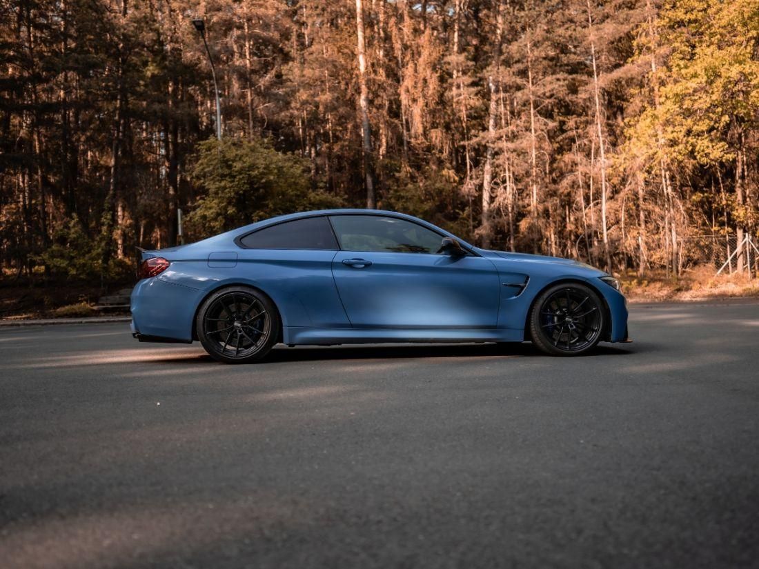 Side View of a blue BMW