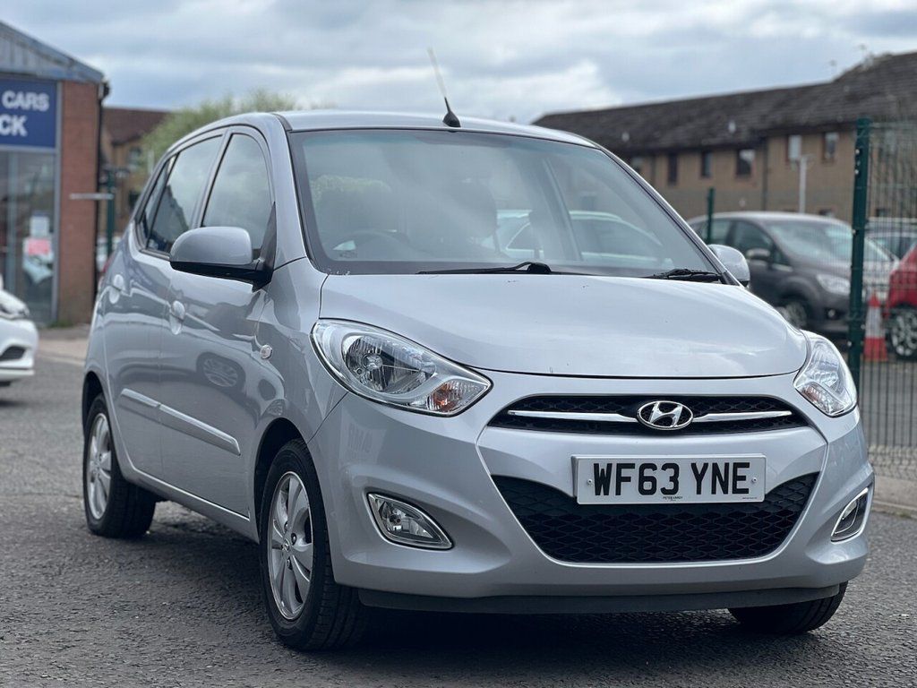 A silver Hyundau i10 parked at Cars 4 You