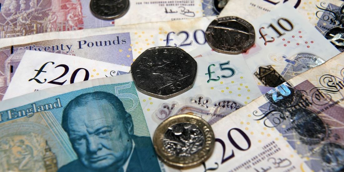 UK Money Stacked on Each Other