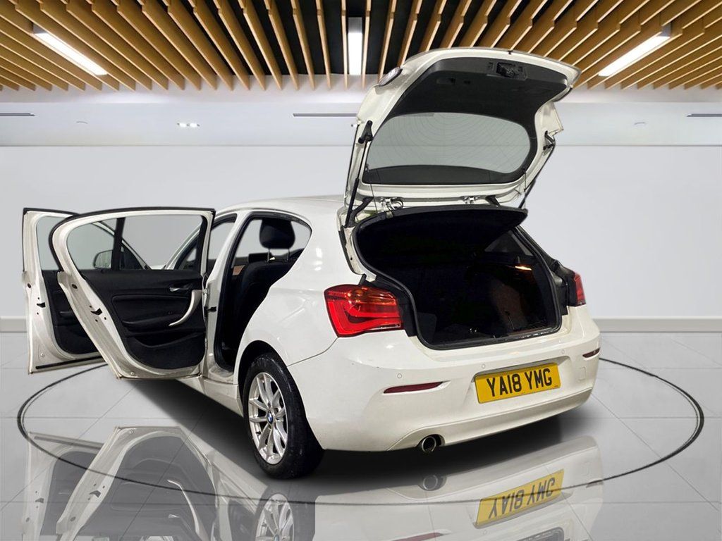 2018 White BMW 1 Series - Rear view showing the open doors and boot space - Hilton Car Supermarket
