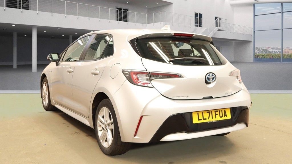 A White Toyota Vehicle On Display