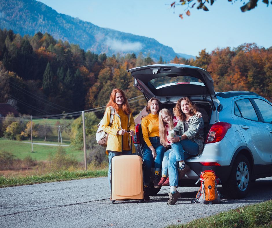 family outside of car