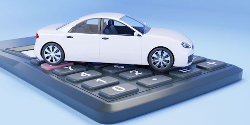 White Toy Car Sitting on Calculator