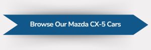 Blue ribbon-shaped banner with white text reading ‘Browse Our Mazda CX-5 Cars’