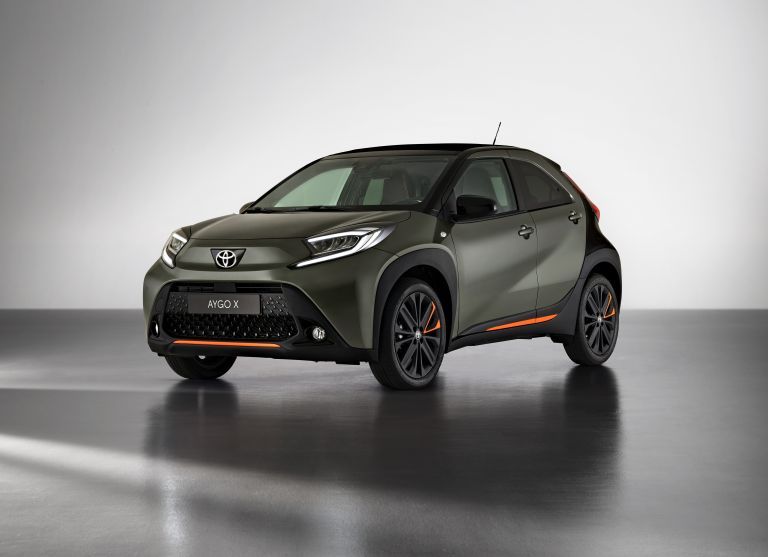 Toyota Aygo X compact crossover hatchback in studio setting with modern styling.