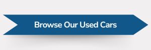 Blue ribbon-shaped banner with white text reading ‘Browse Our Used Cars’