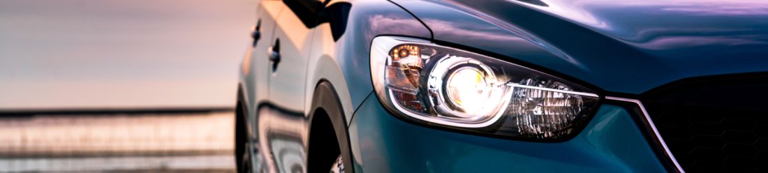 left car headlight glowing