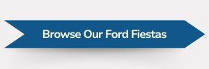 Blue ribbon-shaped banner with white text reading ‘Browse Our Ford Fiestas.’