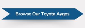 Blue ribbon-shaped banner with white text reading ‘Browse Our Toyota Aygos.’