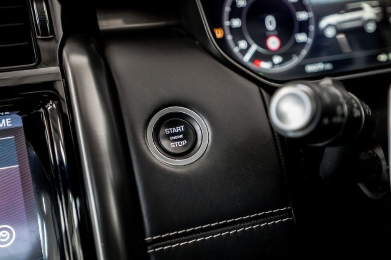 Start/stop engine button in an automatic car.