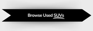 Black ribbon-shaped button with white text that reads 'Browse Used SUVs'
