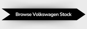 Black ribbon-shaped button with white text that reads 'Browse Volkswagen Stock'