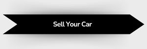 Black ribbon-shaped button with white text that reads 'Sell Your Car'.