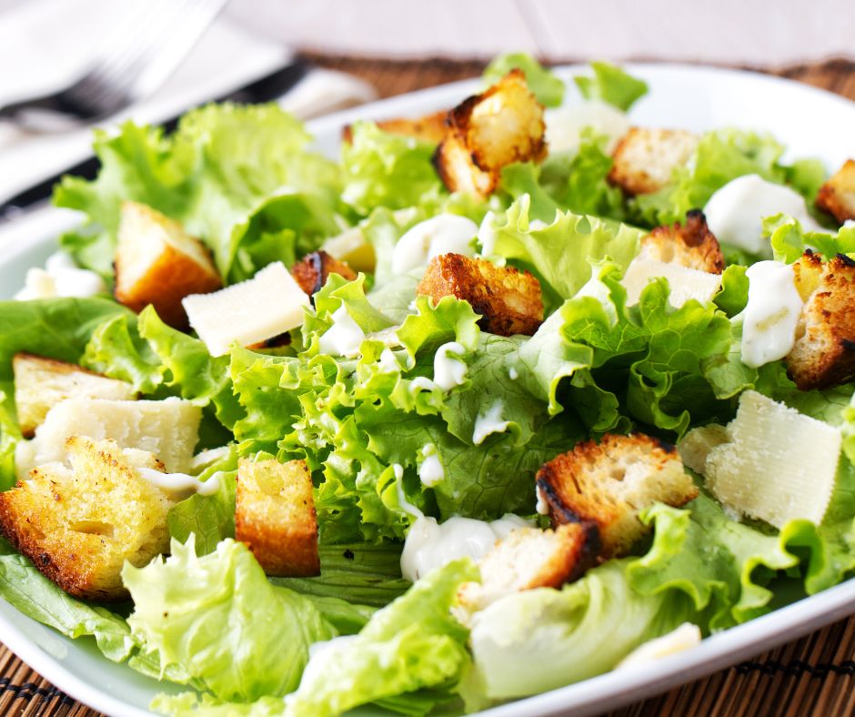 A close up on a Caesar salad.