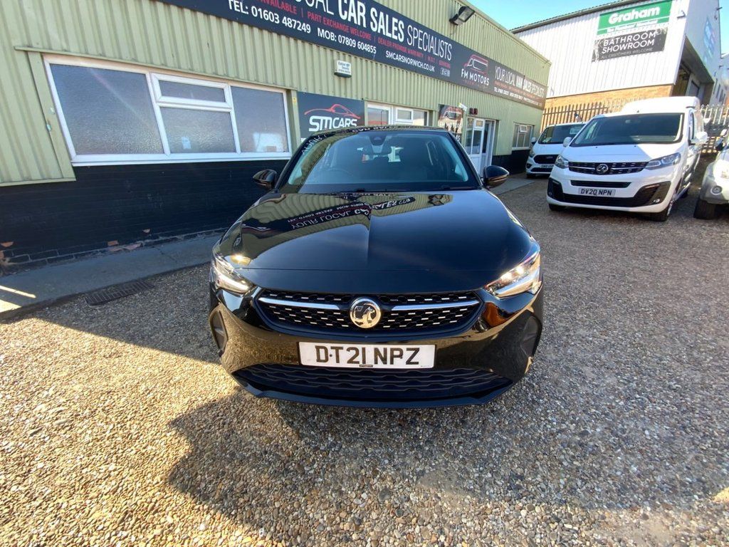 A Black Vauxhall Corsa