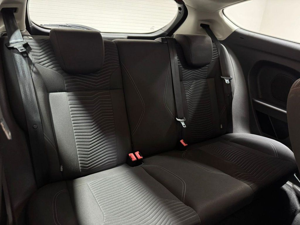 Empty back seats of a Ford Fiesta, showcasing the spacious interior
