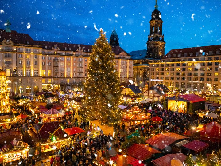 Festive Christmas markets, featuring stalls with holiday decorations, lights, and seasonal treats.			 			