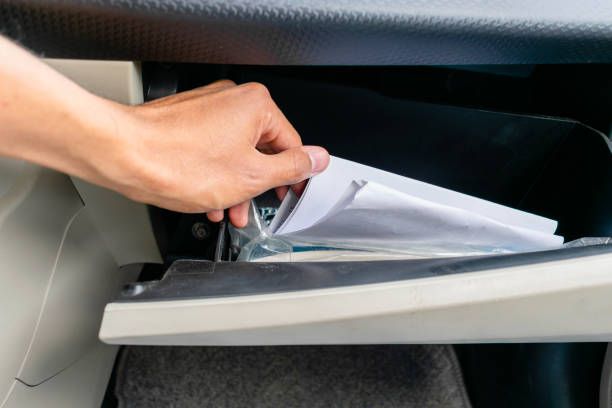 Car documents in glove box 