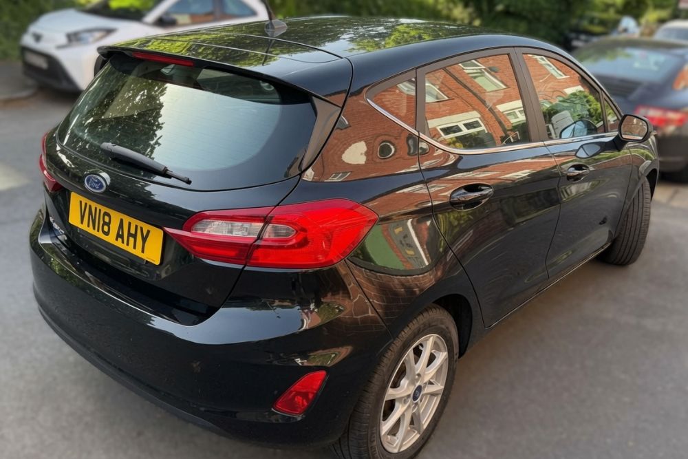 Black 2018 Ford Fiesta Zetec 1.0 EcoBoost hatchback parked for sale at Mersea Cars Colchester Essex