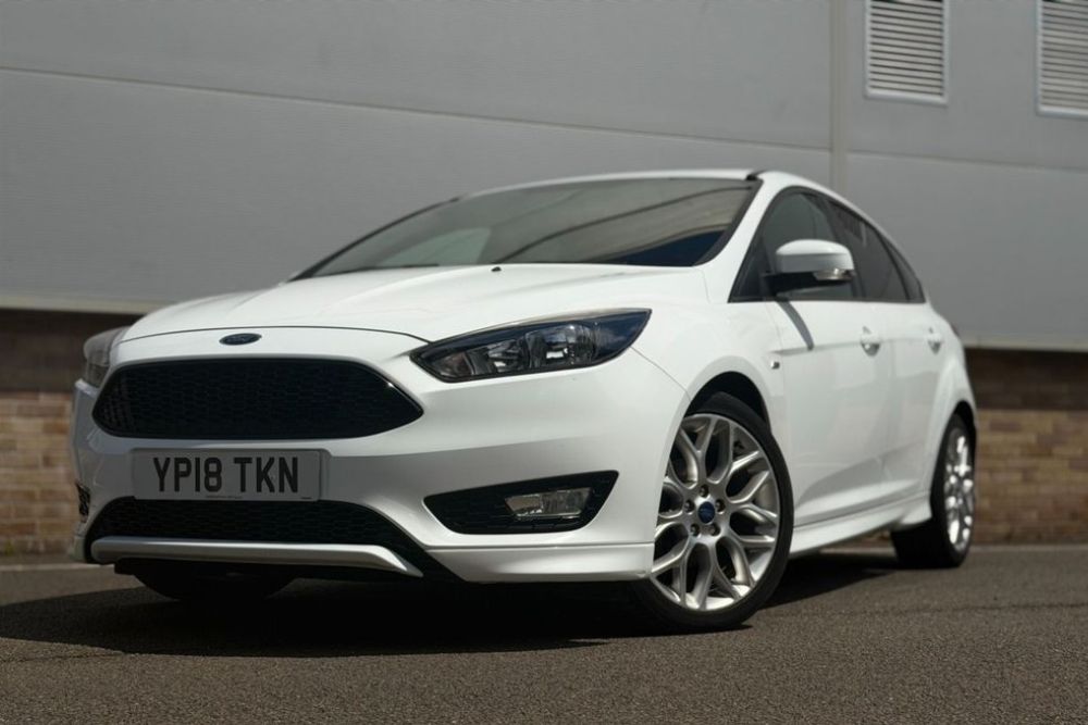 White 2018 Ford Focus ST Line parked at Colchester car dealer forecourt