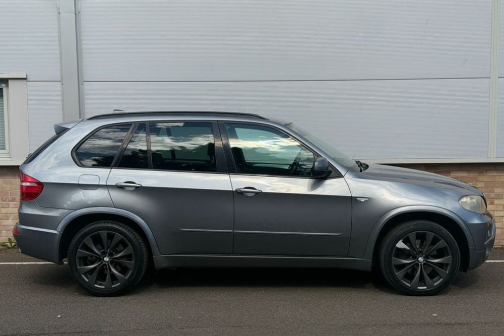 Dakota Grey 2009 BMW X5 35d M Sport 7-seater SUV parked for sale at Mersea Cars Colchester Essex