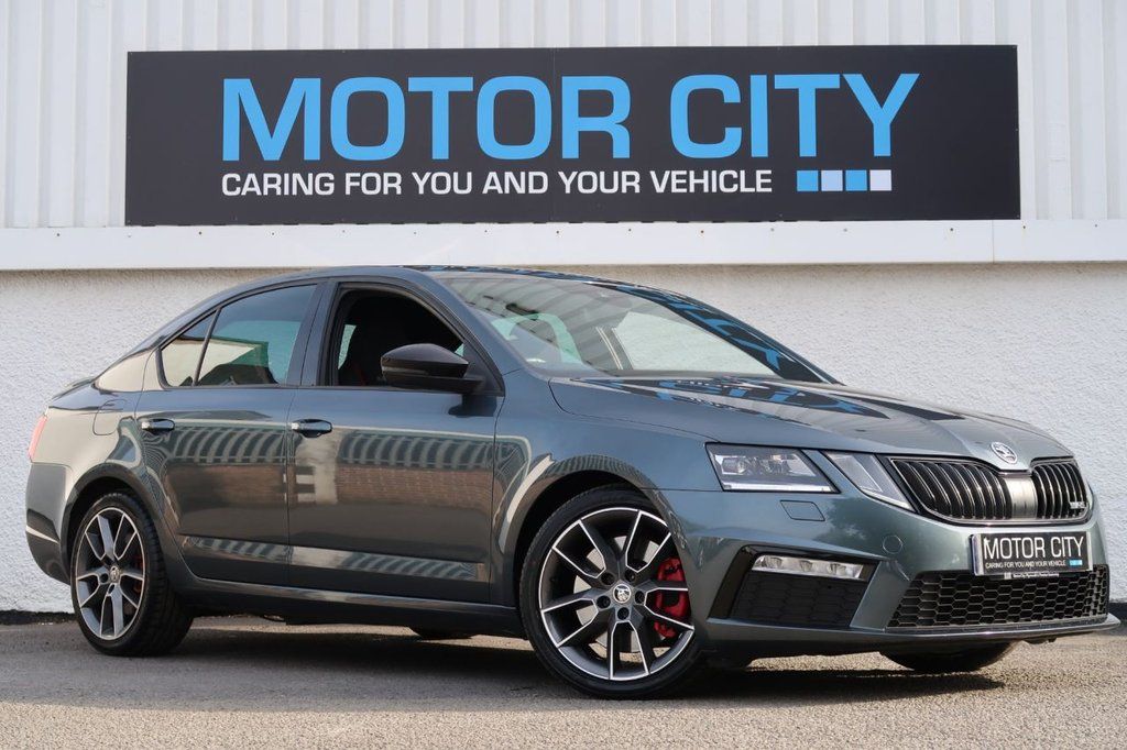 A used Skoda, highlighting its modern style in an urban environment.