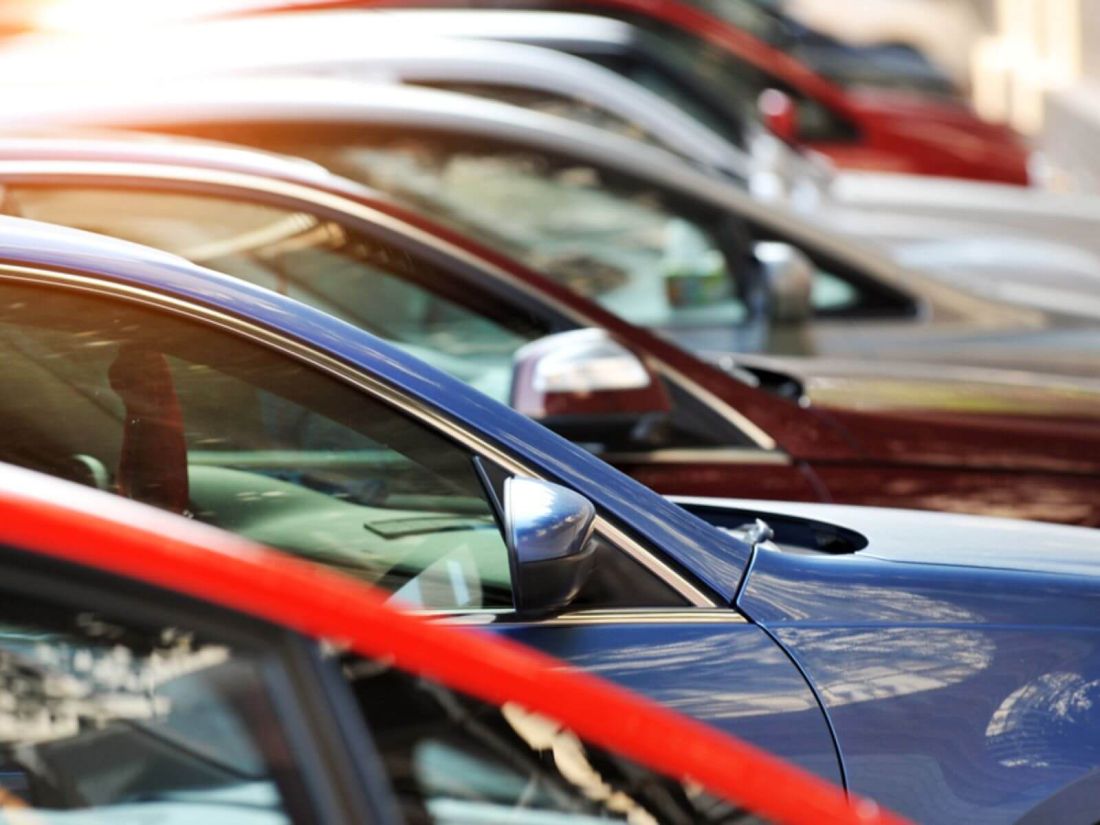 Close up of cars parked in a row