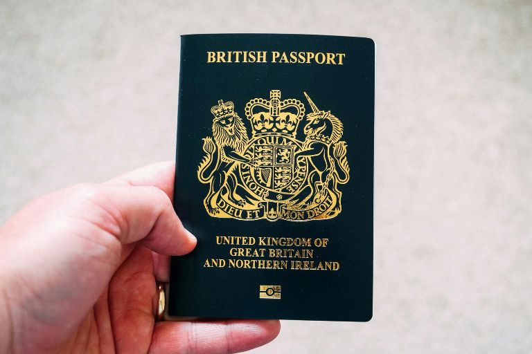 someone holding a Great British passport