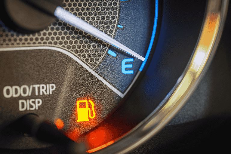 A close up image of a petrol light glowing amber.