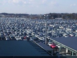 A massive Japanese car auction lot showing thousands of high-quality used vehicles ready for export to the UK.