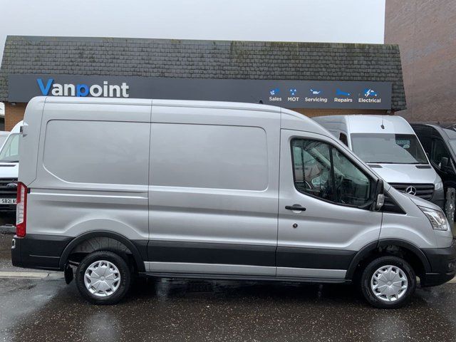 Side-view of a grey panel van
