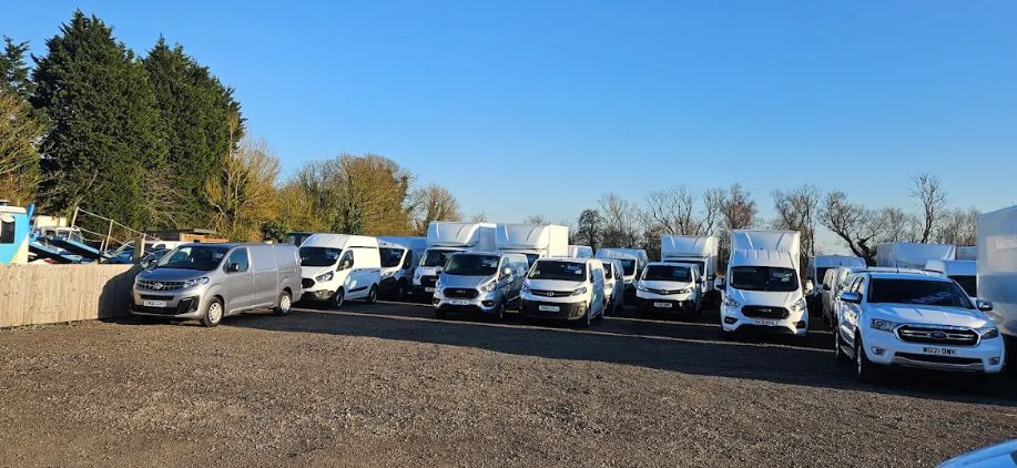 Range of used vans outdoors at Car & Caravan Co