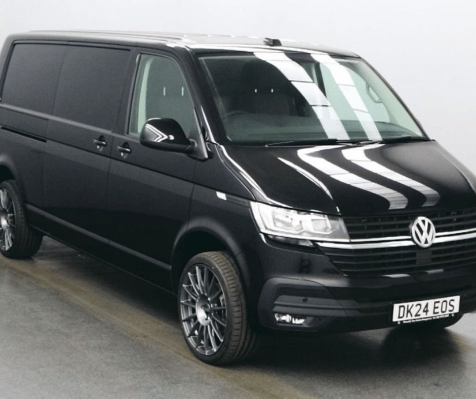 Sleek black Volkswagen Transporter T6.1 4Motion van, perfect for urban and rugged adventures