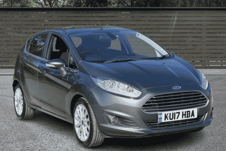 Used grey Ford Fiesta at a acar dealership