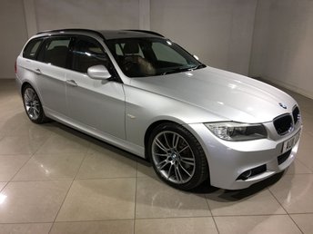 2011 BMW 3 SERIES}