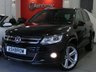 USED 2016 65 VOLKSWAGEN TIGUAN 2.0 TDI R LINE EDITION BLUEMOTION TECH 4MOTION DSG 5d 185 S/S UPGRADE 19 INCH MALLORY ALLOYS, UPGRADE REAR SPOILER, R LINE BODYKIT, DSG AUTO, 4 MOTION 4X4, FULL BLACK LEATHER, HEATED SEATS, ELEC DRIVER'S SEAT, NAV, DAB, FRONT + REAR PARKING SENSORS W/ PARK ASSIST AUTOMATED STEERING, BLUETOOTH W/ AUDIO STREAMING, BI XENONS W/ LED DAYTIME RUNNING LIGHTS + CORNER , AUX + USB IN, DUAL ZONE CLIMATE A/C, LEATHER FLAT BOTTOM MULTI FUNCTION STEERING WHEEL, TYRE PRESSURE MONITORING SYSTEM, AUTO LIGHTS + WIPERS, AUTO DIM REAR VIEW, AUTO HOLD, SP SAVING SPARE, VAT Q