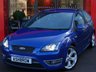 USED 2006 56 FORD FOCUS 2.5 ST-2 3d 225 BHP FULL ST 2 BODY KIT, FRONT FOG LIGHTS, XENON HEADLAMPS, HEADLAMP WASHERS, 18 INCH ALLOYS, TWIN EXHAUST, REAR SPOILER, RECARO SPORT SEATS, GREY / BLUE CLOTH UPHOLSTERY, ALUMINIUM PEDALS, LEATHER STEERING WHEEL, ELECTRIC WINDOWS, ELECTRIC DOOR MIRRORS, TRIP COMPUTER, AIR CONDITIONING, HEATED FRONT & REAR SCREENS, FRONT CENTRE ARM REST, ILLUMINATING VANITY MIRRORS, 3x 3 POINT REAR SEAT BELTS, FOLDING REAR SEATS, PIONEER CD HIFI WITH BLUETOOTH PHONE AUX & USB INPUTS.  GOOD SERVICE HISTORY - 11 STAMPS
