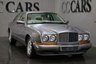 USED 1993 L BENTLEY CONTINENTAL CONTINENTAL R 6.8 TURBO 2d AUTO 384 BHP A Fantastic Opportunity to Own and Drive a Piece of English Motoring Heritage Presented in a Beautiful Colour Combination of Diamond Blue Silver Metallic with Sumptuous Parchment Leather and Dove Grey Hide to Steering Wheel with Shale Grey Carpets, Heated Electric Memory Seats to the Front, Burr Elm Wood Interior Trim to Centre Console, Dash and Fixed Telephone Handset 18 Inch Alloy Wheels Red Label Centre Caps Ice Cold Dual Zone Climate Control Digital Clock and Temperature Gauge A Fine Example