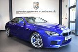 USED 2014 64 BMW M6 4.4 2DR AUTO 553 BHP 1 Owner service plan SAN MARINO METALLIC BLUE WITH FULL SILVERSTONE LEATHER INTERIOR + FULL BMW SERVICE HISTORY + 1 OWNER FROM NEW + PRO SATELLITE NAVIGATION + HEAD-UP DISPLAY + HEATED SPORT SEATS + BLUETOOTH + REVERSE CAMERA + HARMAN/KARDON SPEAKERS + SOFT-CLOSE DOORS + 20 INCH ALLOY WHEELS