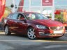 USED 2014 64 VOLVO V60 2.0 D4 SE LUX NAV 5d 178 BHP STUNNING, 1 Owner, VOLVO V60 2.0 D4 SE LUX NAV. Finished in FLAMENCO RED MET with contrasting BLACK HEATED LEATHER ELECTRIC MEMORY SEATS. Volvo have come a long way since the days of bulletproof boxes on wheels. They now produce some of the coolest cars around. This remarkably sleek estate comes with features that include, Auto Parking, Zero Tax, Sat Nav, DAB, Memory Seats, Headlight Washers and much more