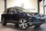 USED 2015 65 VOLKSWAGEN TOUAREG 3.0 V6 R-LINE TDI BLUEMOTION TECHNOLOGY 5DR AUTO 259 BHP full vw service history FINISHED IN STUNNING MOONLIGHT METALLIC BLUE WITH FULL LEATHER INTERIOR + FULL VW SERVICE HISTORY + SATELLITE NAVIGATION + PANORAMIC ROOF + BLUETOOTH + HEATED SEATS + HEATED STEERING WHEEL + DAB RADIO + CRUISE CONTROL + ELECTRIC FOLDING MIRRORS + PARKING SENSORS + 20" ALLOY WHEELS