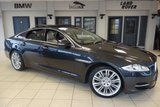 USED 2015 64 JAGUAR XJ 3.0 D V6 PORTFOLIO 4d AUTO 275 BHP full jaguar service history FINISHED IN STUNNING STRATUS GREY WITH FULL LEATHER SEATS + FULL JAGUAR SERVICE HISTORY + SATELLITE NAVIGATION + REVERSE CAMERA + XENON HEADLIGHTS + 20 INCH ALLOYS + HEATED/COOLED FRONT/REAR SEATS + HEATED STEERING WHEEL + BLIND SPOT ASSIST + 4 ZONE AIR CONDITIONING + BLUETOOTH + DAB RADIO + CRUISE CONTROL