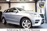 USED 2014 14 MERCEDES-BENZ M CLASS 3.0 ML350 BLUETEC AMG SPORT 5DR 258 BHP FINISHED IN STUNNING DIAMOND METALLIC SILVER WITH HALF LEATHER INTERIOR + SATELLITE NAVIGATION + BLUETOOTH + AMG STYLING PACKAGE-FRONT SPOILER, SIDE SKIRT + CRUISE CONTROL + ELECTRIC ADJUSTABLE SEATS + ACTIVE PARK ASSIST + 19" ALLOY WHEELS