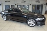 USED 2015 15 AUDI A6 2.0 TDI ULTRA S LINE 4d AUTO 188 BHP FINISHED IN STUNNING PANTHER BLACK WITH HALF BLACK LEATHER SEATS + EXCELLENT AUDI SERVICE HISTORY + SATELLITE NAVIGATION + ELECTRIC TAILGATE + 18 INCH ALLOYS + £20 ROAD TAX + HEATED FRONT/RAER SEATS + BLUETOOTH + DAB RADIO + PARKING SENSORS + AIR CONDITIONING
