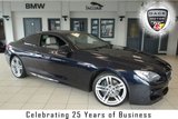 USED 2014 14 BMW 6 SERIES 3.0 640D M SPORT 2d AUTO 309 BHP FINISHED IN STUNNING CARBON BLACK WITH FULL NAPA CREAM LEATHER SEATS + FULL BMW SERVICE HISTORY + PRO SATELLITE NAVIGATION + HEADS UP DISPLAY + REVERSE CAMERA + WIRELESS CHANRGING + HEATED FRONT COMFORT SEATS WITH MEMORY + 19 INCH ALLOYS + ENHANCED BLUETOOTH + DIGITAL COCKPIT + DAB RADIO + TINTED GLASS + CRUISE CONTROL