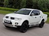 USED 2010 60 MITSUBISHI L200 2.5 DI-D 4X4 BARBARIAN LB DCB 1d AUTO 175 BHP SAT NAV + LEATHER + SPORT BACK TOP