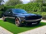 USED 2010 60 DODGE CHALLENGER 6.1 SRT-8 2d The Ultimate Example of the Dodge Challenger Loaded with £25,000 of Additional Features, This Unique Enhanced Challenger SRT was Previously Used as a Promotional Vehicle to Demonstrate the Best Enhancements for In Car Audio and Air Ride Systems. Presented in Special Order Metallic Black Paintwork with 22 Inch Gold Split Rim Alloy Wheels, Brembo Brakes with Red Callipers and Recent New Tyres. Features Include Airlift Performance, Air Ride Suspension with In-Car V2 Management.