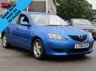 USED 2006 06 MAZDA 3 1.6 TS 5d AUTO 105 BHP FINANCE OR CREDIT CARDS NOT ACCEPTED. Finished in AURORA BLUE metallic with contrasting BLACK CLOTH trim. Dealer serviced at 10672 miles, 20203 miles, 25553 miles, 38565 miles, 50566 miles, 69496 miles and at 82328 miles.